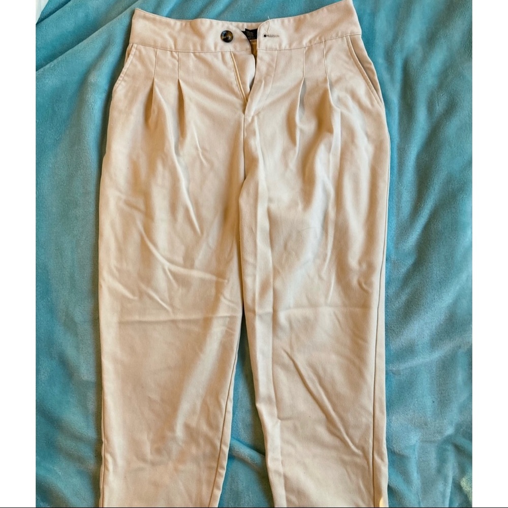 Vintage-style high-waist white pants